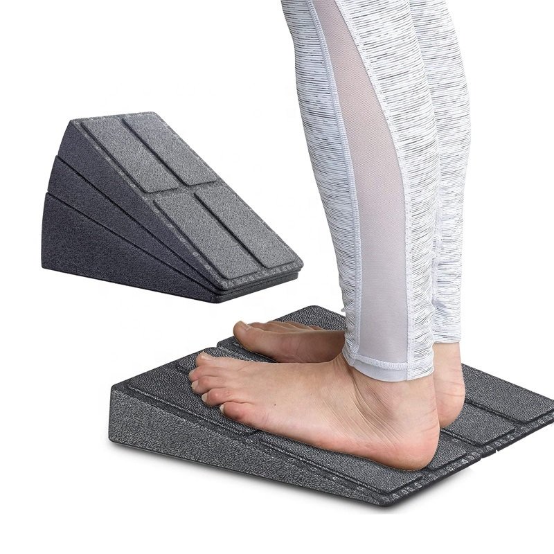 Squat wedge block (Bloczek do przysiadów pod stopy) Kostka do jogi – jak wybrać dobry model?